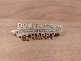 Brosche "Don't Worry, Be Happy" mit Strasssteinen