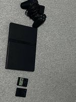 PlayStation 2 Konsole mit Original-Controller & 2 Spielen
