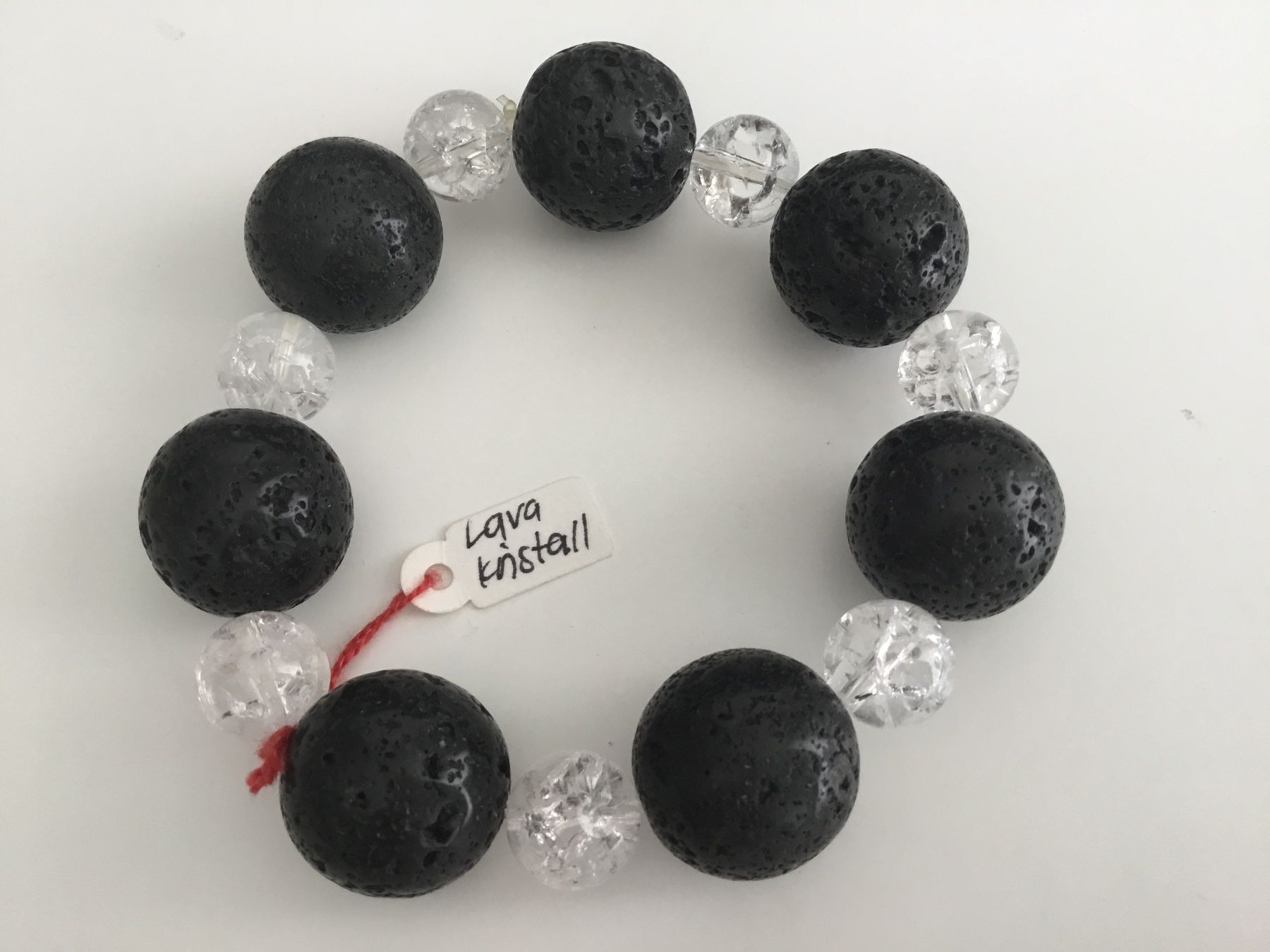 Bracciali & Braccialetti: Armband elastisch Lava und Bergkristall – Nuovo e nell'imballaggio originale da Doppleschwand venduto da Fortuna5859
