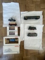 8 Modell Züge von verschiedener Art.