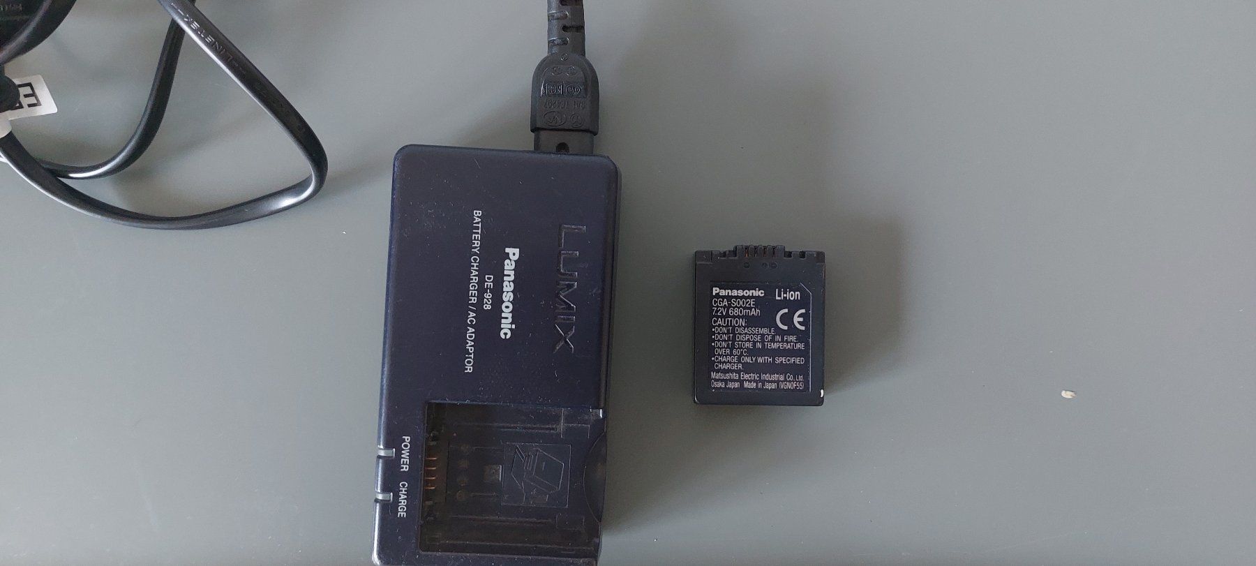Panasonic Altri Accessori: Panasonic Adapter DE-928B + Batterie CGA-S002E – Usato da Adliswil venduto da JulienCycling