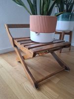 Klapphocker aus Holz braun in gutem Zustand (+ Pflanze)