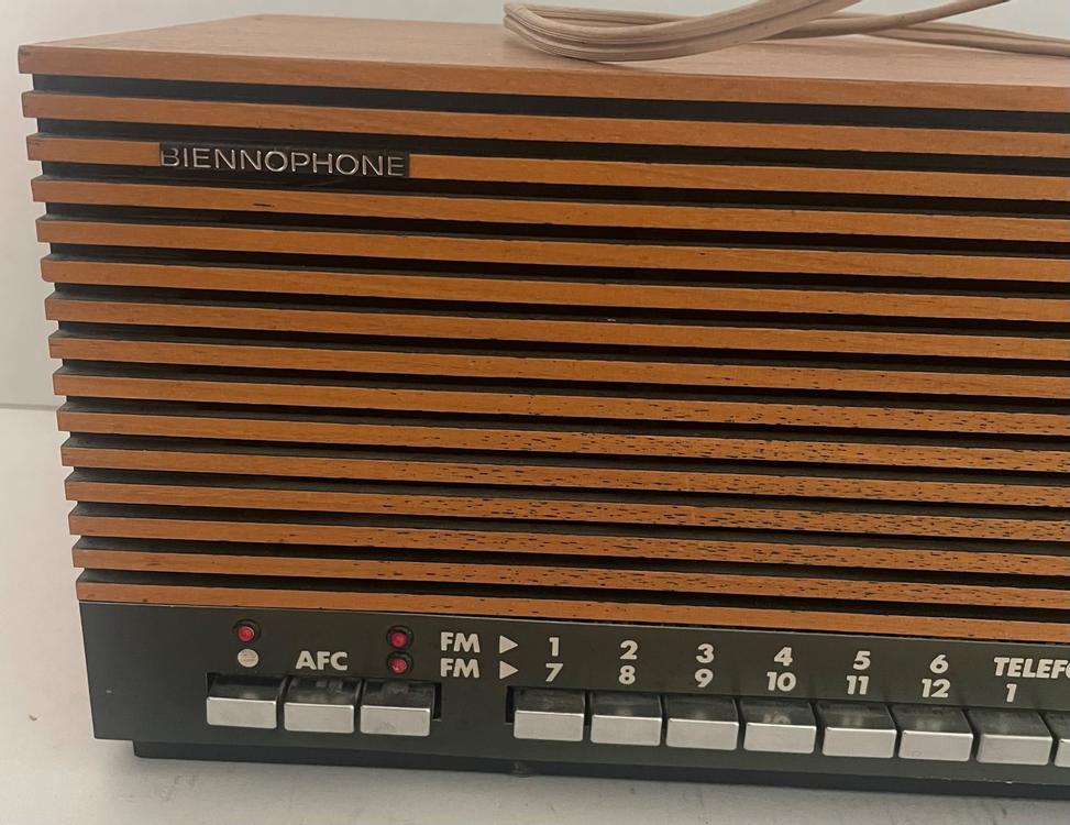 dreieckiges Emblem BIENNOPHONE von altem Radio, 50er Jahre