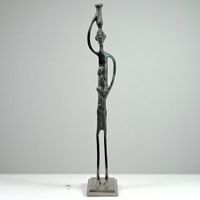 Sculpture africaine longiligne en bronze à patine noire