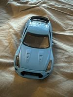 Modellauto Sportwagen hellblau Metall Massstab 1:32