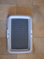 Toilettentraining von Welpen oder Katzentoiletten