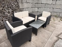 Gartenlounge Rattan 4-tlg. mit Glastisch