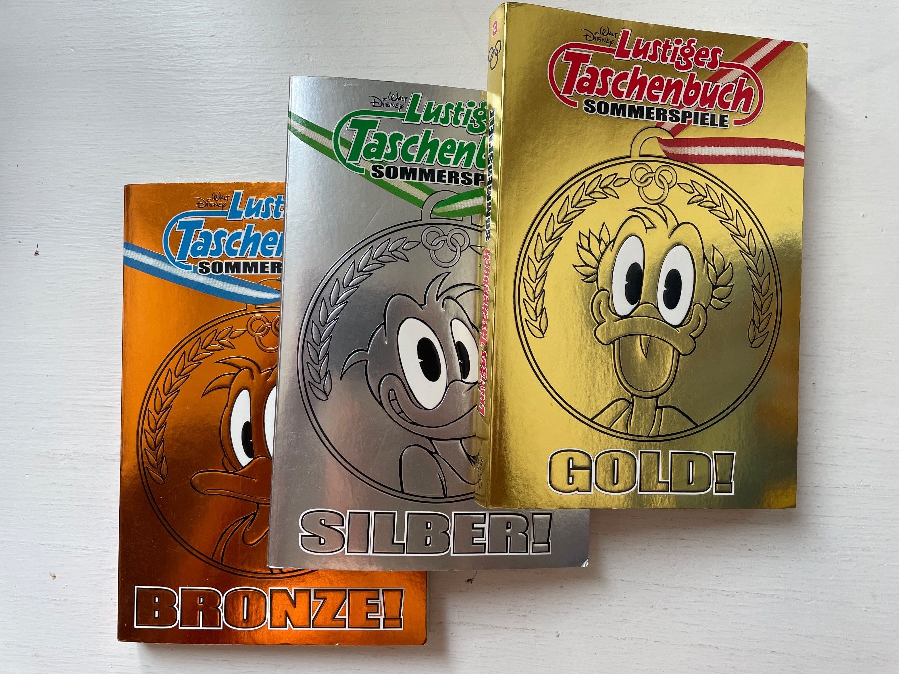 Fumetti: Lustiges Taschenbuch - Sommerspiele Gold / Silber / Bronze – Usato da Zürich venduto da Andy_t71