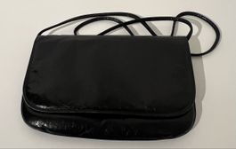 Pochette noire vintage en cuir brillant