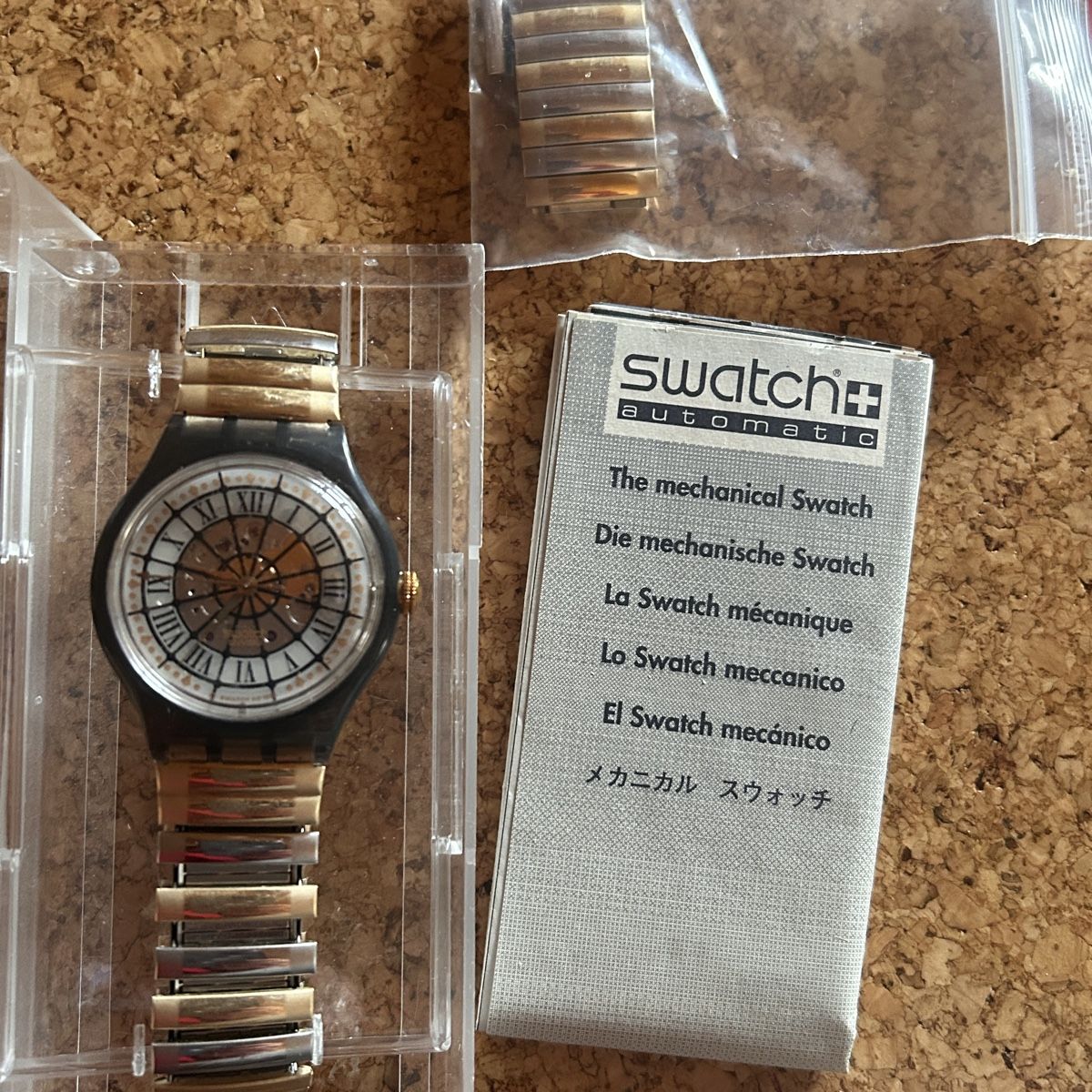 Swatch Orologi: Swatch Automatik Uhr, Gold/Schwarz – Nuovo (secondo la descrizione) da Laufen venduto da Bellavitaboom 1