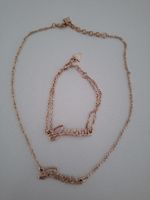 Set di collana e bracciale Guess, color oro rosa