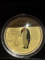 1 Dollar “Pinguin“ Münze von 2013 versilbert