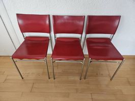8 Designerstühle Kernleder rot