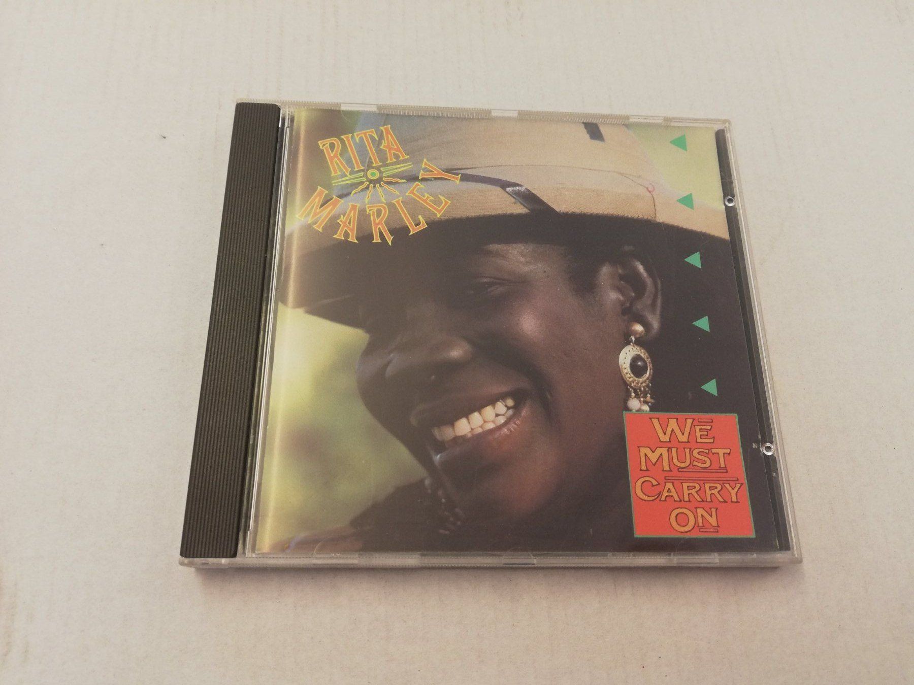 CDs: RITA MARLEY - WE MUST CARRY ON – Gebraucht aus Bern von Vinylsound.ch