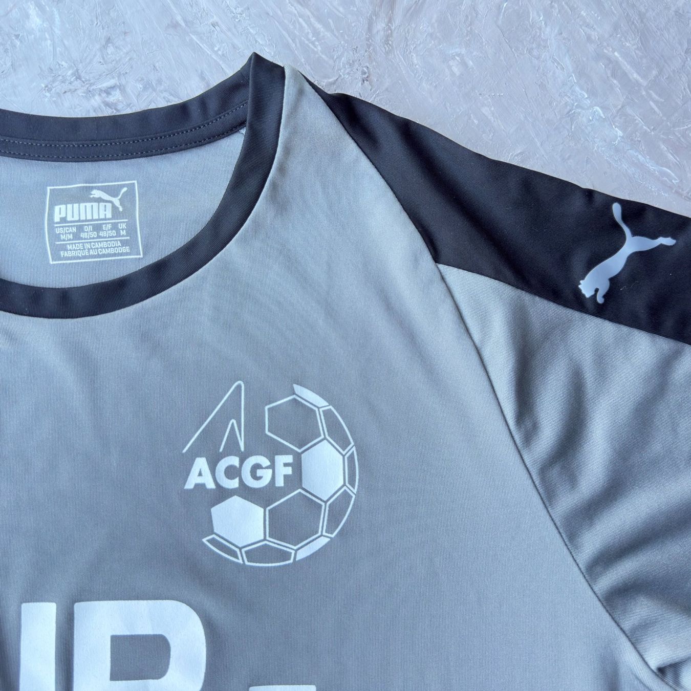Puma T-shirt: T-shirt Puma ACGF Fair Play gris – Usato da Thônex venduto da Suisse.Shopping 3