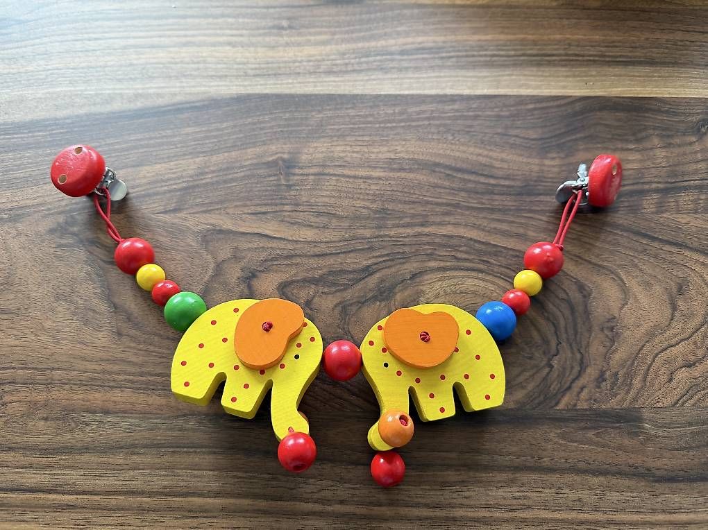 Giocattoli: Kinderwagenkette Holz bunte Elefanten – Usato da Winterthur venduto da jgroeble