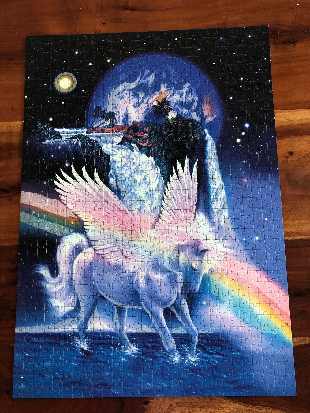 Ravensburger Puzzles: Adventskalender Puzzle, Pegasus mit Regenbogen und Erde – Gebraucht aus Gelterkinden von Familienferien