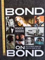 Roger Moore, Original Autogramm, auf Buch  Bond on Bond