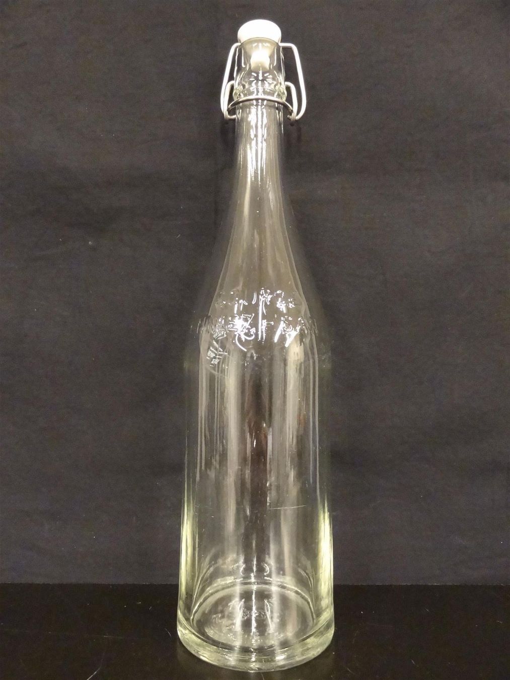 Bicchieri, Caraffe & Bottiglie: alte Flasche HENNIEZ SANTÉ – Usato da Kerzers venduto da Flaschenposten