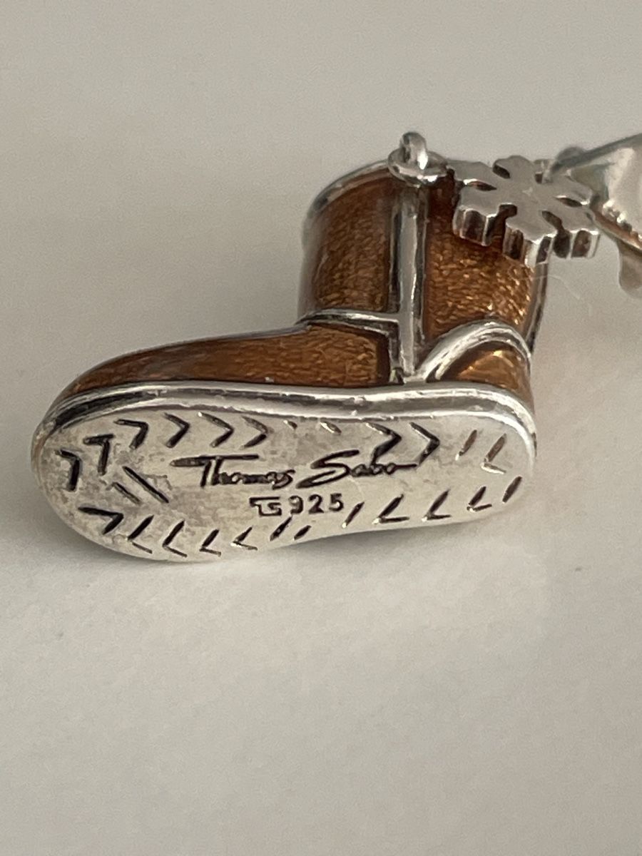 Thomas Sabo Ciondoli: Charm Thomas Sabo, botte style UGG et flocon de neige – Usato da Le Grand-Saconnex venduto da sav_dfj7