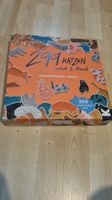 Katzenpuzzle: 299 Katzen und 1 Hund