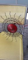 Toller Wandschmuck für die Terrasse Motiv Sonne in Rot