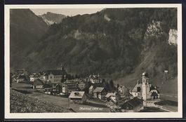 AK Melchtal, Ortsansicht mit Berghängen