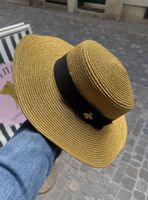 Geflochtener goldener Sommerhut
