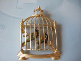Brosche goldfarben mit Vögel im Käfig