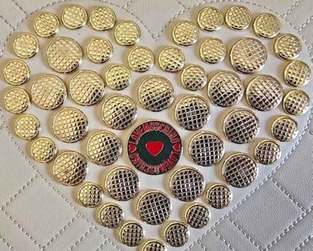Sac à main Love Moschino matelassé couleur beige état neuf