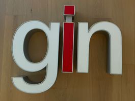 Vintage Leuchtbuchstabe „gin“ – Swiss Aviation Training