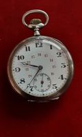 Belle ancienne montre en argent  et beau mouvement