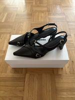 Irregular Heeled Mules – Social Work