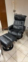 Fauteuil relax stressless en cuir noir avec repose-pieds