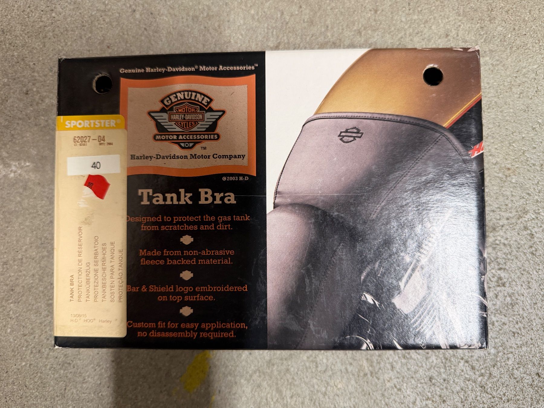 Harley-Davidson Tutti i ricambio per moto: 62027-04 Harley-Davidson Tank Bra – Nuovo e nell'imballaggio originale da Ostermundigen venduto da jas_9j7d 1