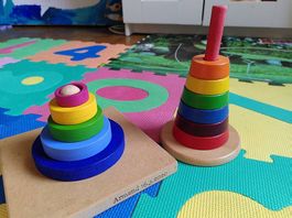 Giochi in legno  torri ad anelli colorate