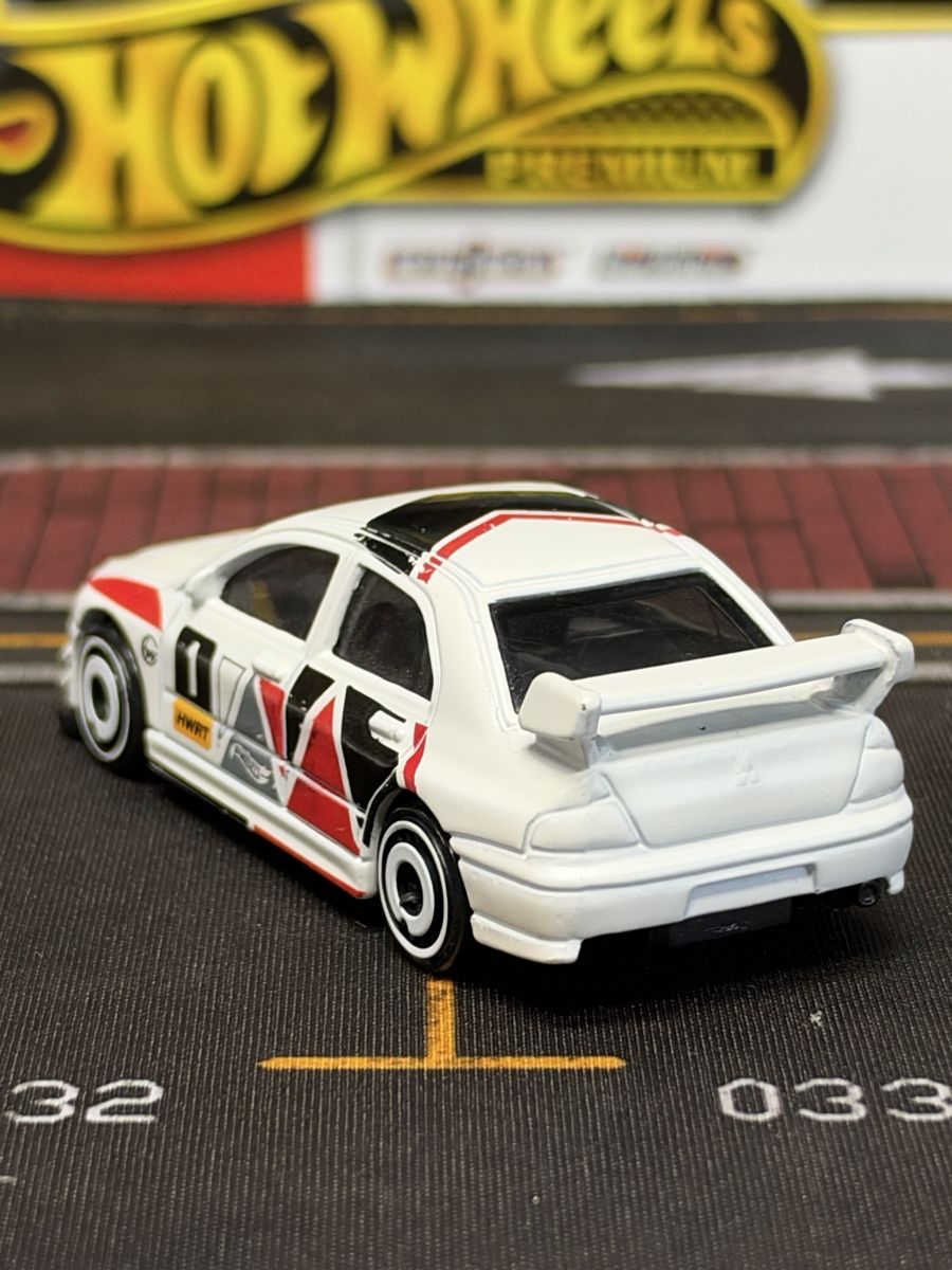 Hot Wheels Modellini d'auto: Hot Wheels Lancer Evolution IX blanc édition premium 1/64 – Usato da rolle venduto da Noma-collectible 2