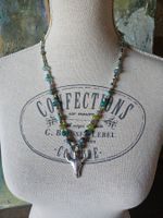 collier tête de buffle perles vertes