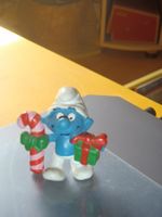 Schlumpf mit Stock und Packet