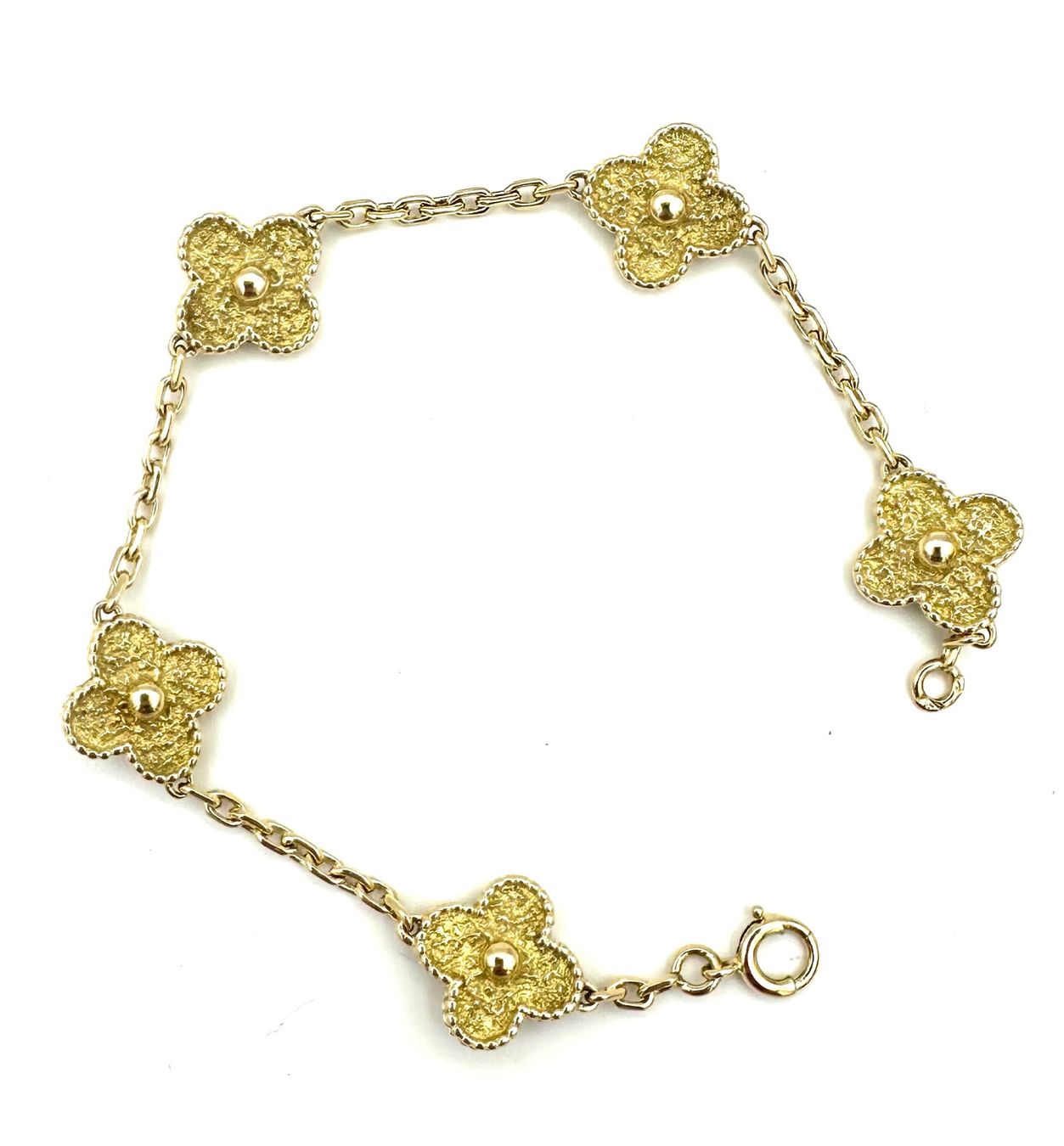 Van Cleef Bracciali & Braccialetti: VAN CLEEF. Collection "Vintage Alhambra", bracelet or jaune – Usato da Renens VD venduto da Diademe.sarl 2
