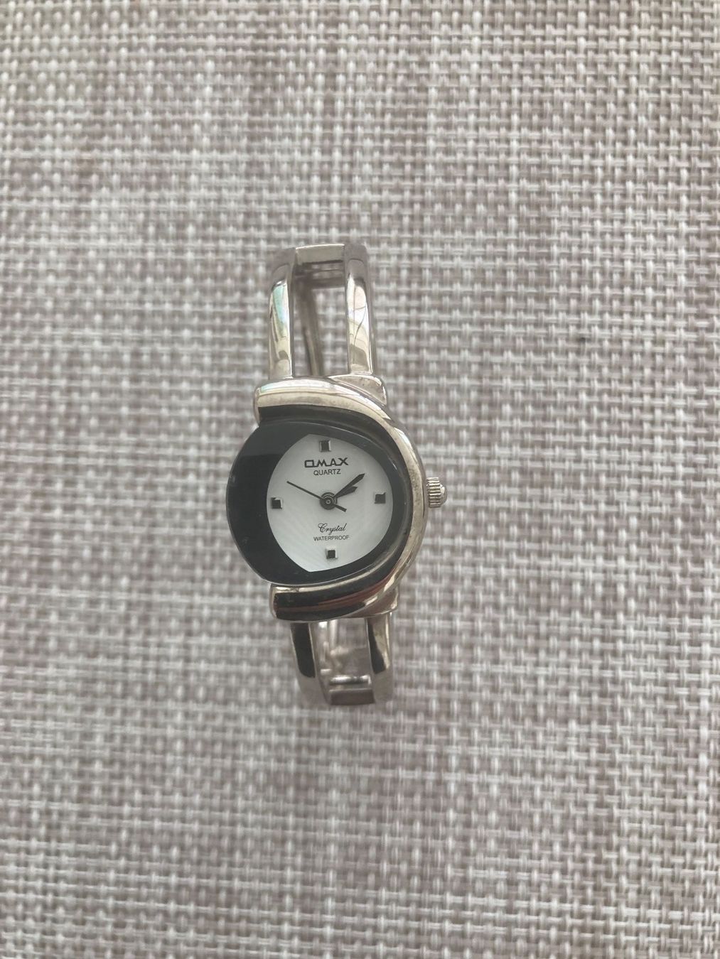 Uhren: QMAX Quartz Uhr – Gebraucht aus Wilderswil von Feldbach