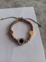 Bicolor Armband mit schwarzen Mittelteil, ein echter Hinguck