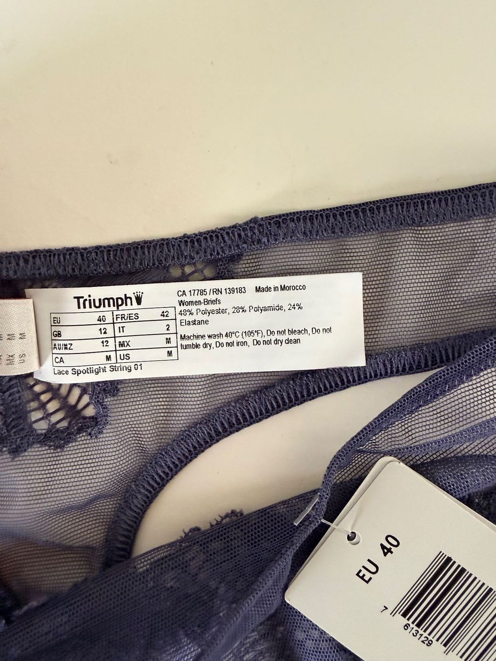 Triumph Sonstige Unterwäsche: TRIUMPH, String LACE SPOTLIGHT, Grösse 40, Farbe Lila – Neu und originalverpackt aus Rudolfstetten von gst_g7xl 2