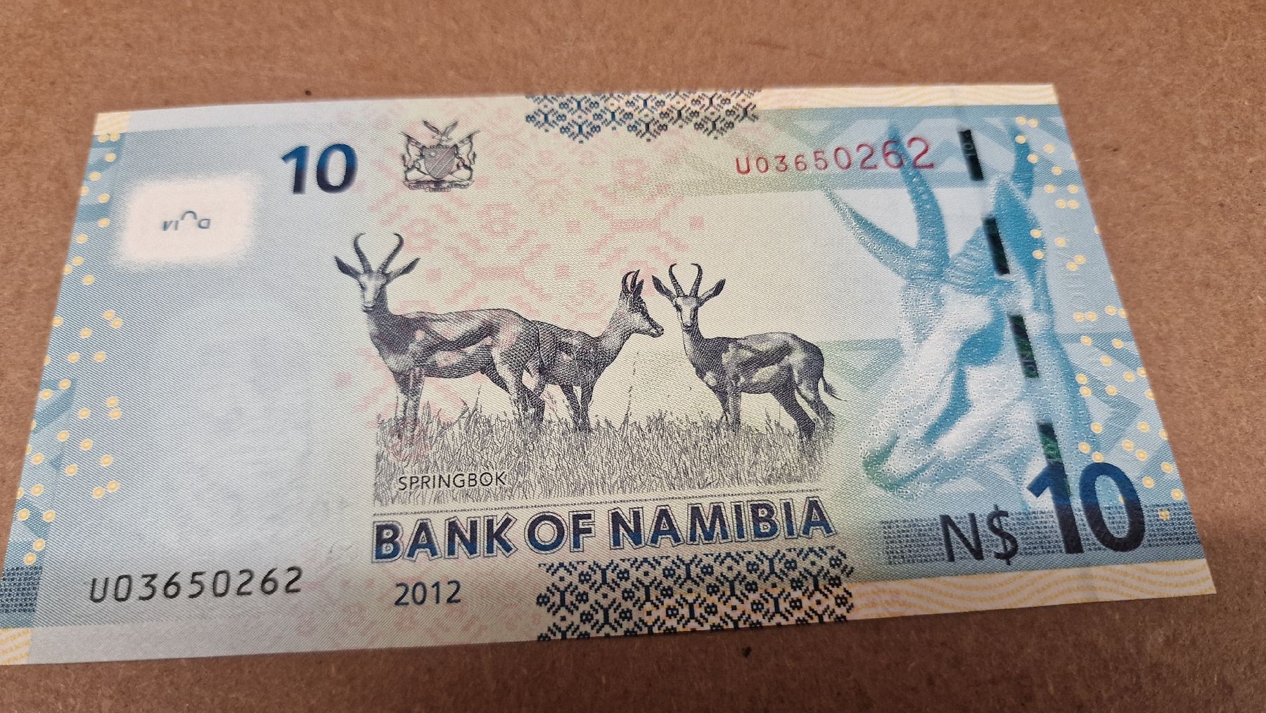 Banconote: Namibia 10 Dollar 2012, Springbock, Sam Nujoma – Nuovo e nell'imballaggio originale da Herisau venduto da Antiques.AR 1