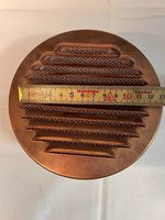 Grille de façade en cuivre avec manchon