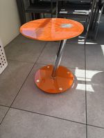 Beistelltisch rund orange Glas Metall guter Zustand