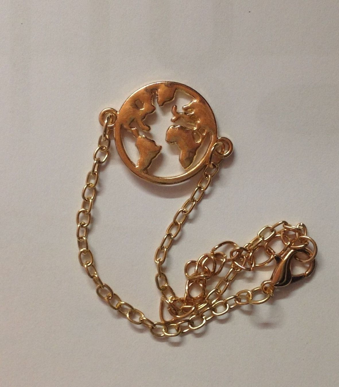 Bracelets: Bracelet Doré - La Terre – D'occasion à Le Brassus par cinema13
