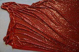 Deko Stoff in rot mit Sternen und Monden in Gold