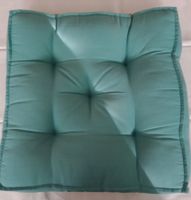 Mintfarbene Sitzkissen der Marke Butlers