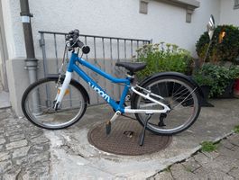 Woom 4, 20 Zoll mit SRAM GripShift/8-Gang-Schaltung